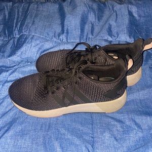 Black Adidas tennis shoes